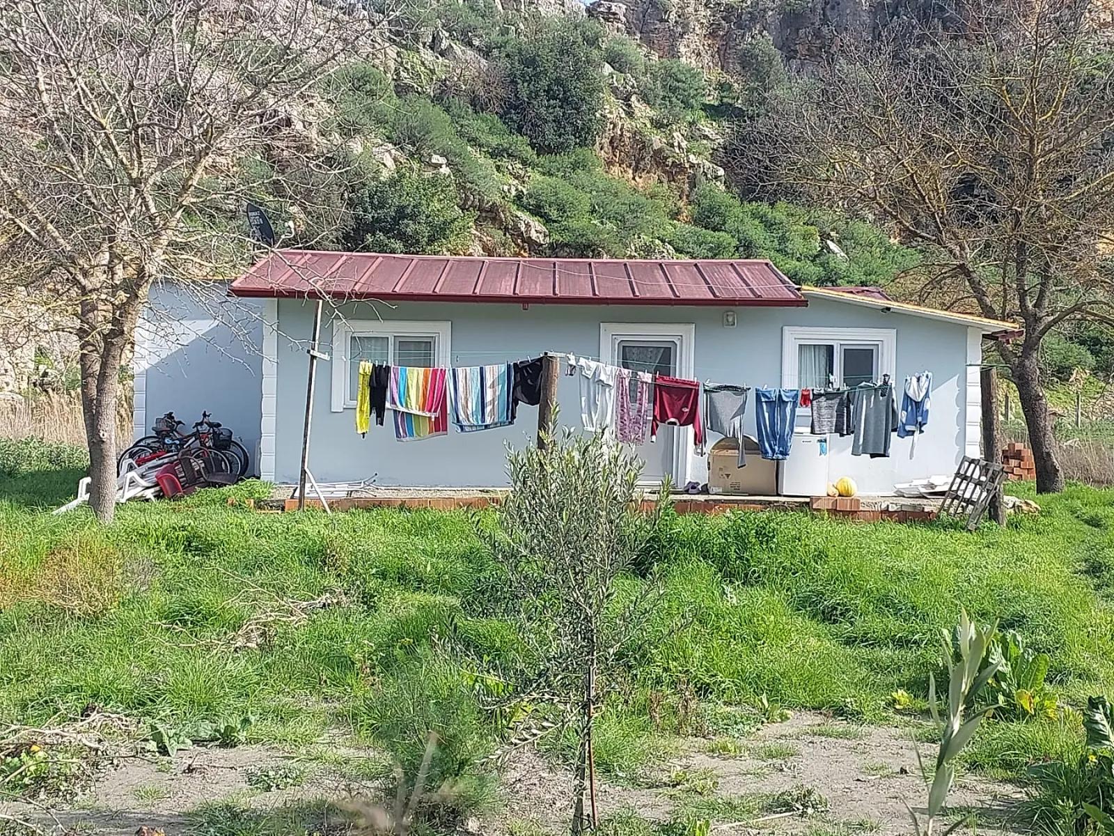 Muğla Dalyanda 1.000 m2 titled land, and 150 m2 2+1 village house for sale, with an apartment from Ortaca