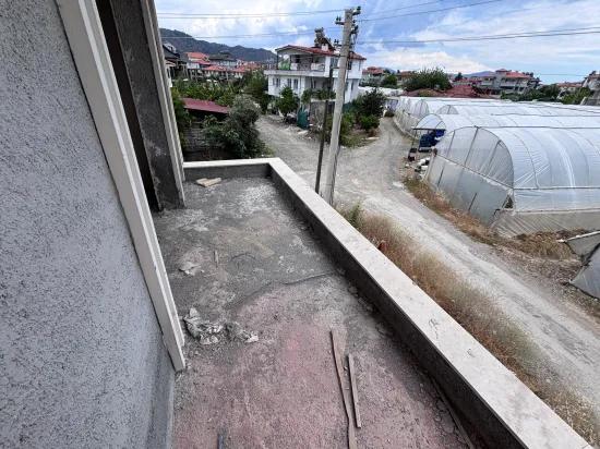 Brand new 1+1 apartment on the middle floor of a 3-storey building In Muğla Ortaca, for sale.