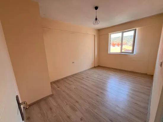 In Ortaca centre shop upstairs 2+1, unfurnished house for rent