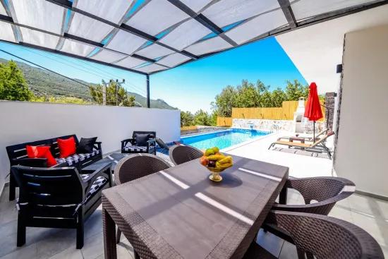 Antalya, Kaş, Kalkan, In İslamlar 1.000 M2 Detached Title Deed Partially Sea View House For Sale