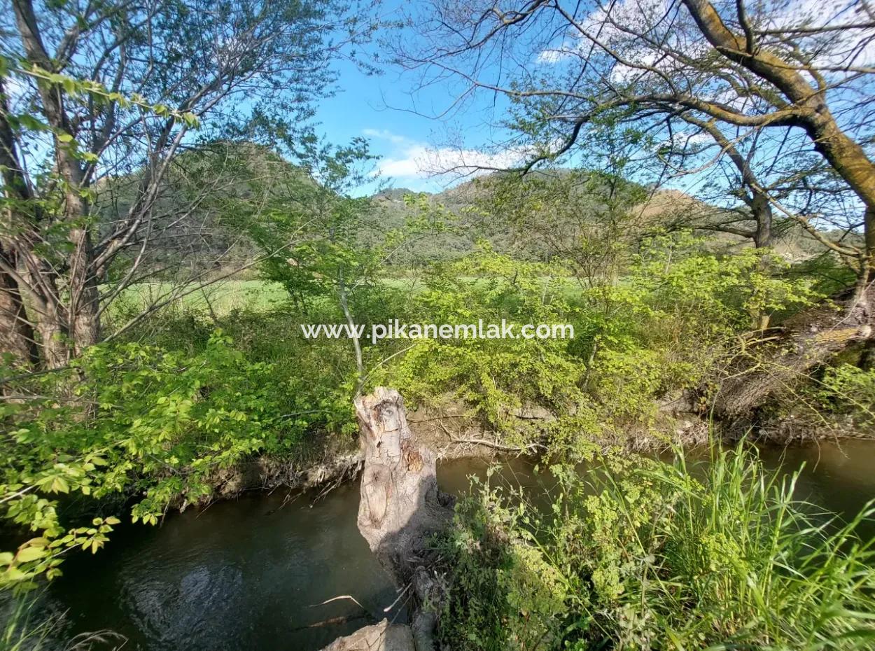 In Muğla Ortaca Eskiköy, 12.805 M2 Of Land With A Share Is For Sale.
