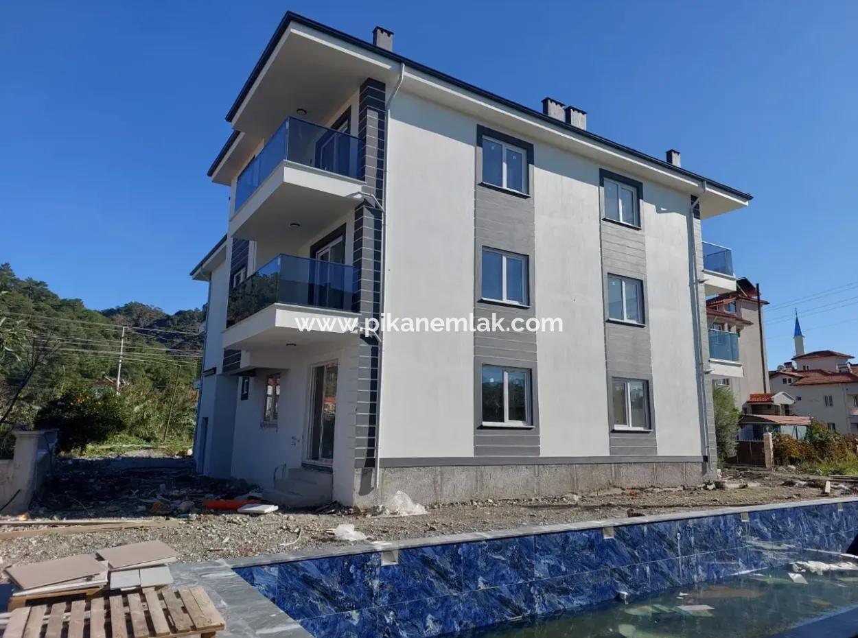 2 1 Flats For Sale On The Middle Floor Of A Brand New 3-Storey Building With A Swimming Pool In The Center Of Muğla Ortaca
