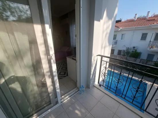в Muğla Dalyan 2+1 с плавательным бассейном 2+1, 95 m2 квартира продаётся