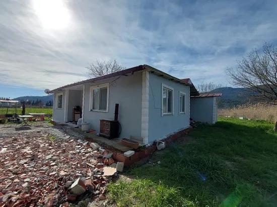 Muğla Dalyanda 1.000 m2 tapulu arazi, de 150 m2 2+1 Köy evi satılık, Ortacadan daire İle