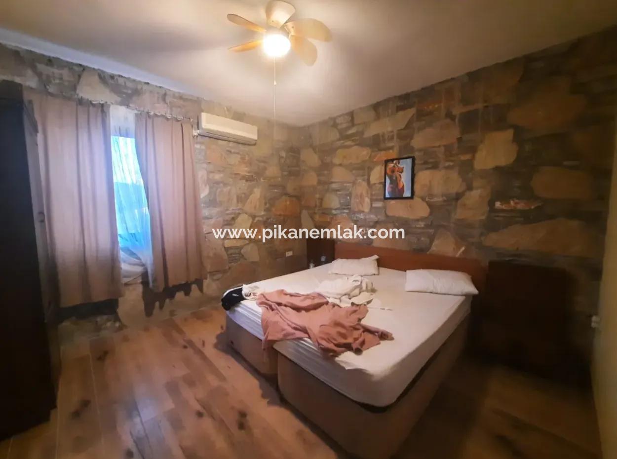 Muğla Dalyan Gökbelde Deniz Manzaralı, Yüzme Havuzlu, 1800 M2 Arazide 2+1  Eşyalı Taş Ev Satılık